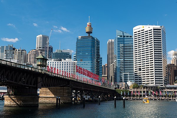 The heritage listed Pyrmont Bridge spans the width of the harbour