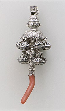 Early 19th century silver child's rattle and coral teether, in the collection of the Metropolitan Museum of Art. British, imported to the United States. Original ownership attributed to the daughter of Duncan Phyfe. Child's rattle and teether MET ES2851.jpg