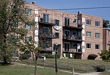 Copeland Manor, an apartment cooperative in Marshall Heights. The building is typical of the style used for many apartment buildings in the neighborhood. Copeland Manor Washington DC.jpg