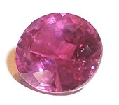 The red color of rubies is due to trace amounts of chromium within the corundum. Cut Ruby.jpg