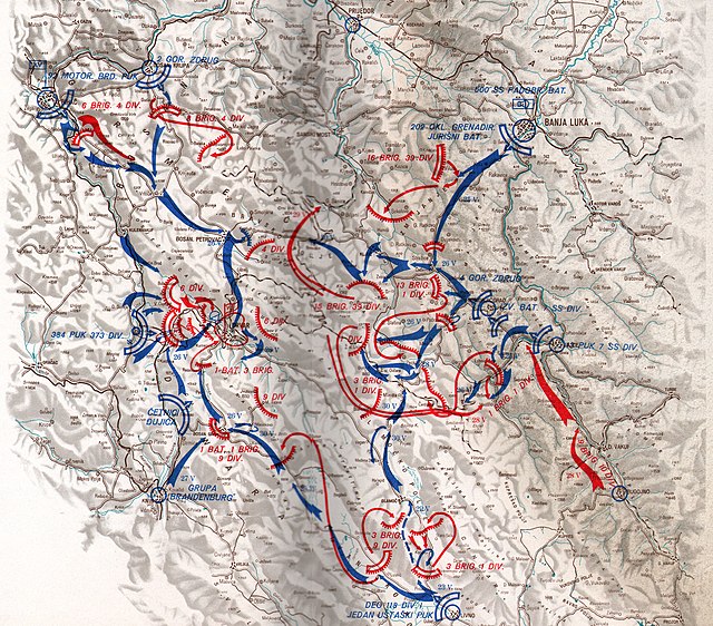 The deployment of Partisan forces around Drvar is shown in red, with German movements shown in blue