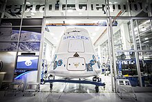 A Dragon capsule being shipped out of SpaceX HQ in Hawthorne, California, February 2015. Dragon capsule being shipped out of SpaceX Hawthorne facility (16655995541).jpg