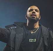 Drake (pictured) earned two number-one singles this year, "Popstar" with DJ Khaled and "Laugh Now Cry Later" with Lil Durk. Drake and Future 2016 Summer Sixteen Tour.jpg