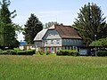 Wohnhaus (Umgebinde) über winkelförmigem Grundriss