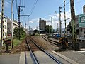 旧駅舎を踏切から東望。左手を直進するのがえちぜん鉄道、右手で行き止まっているのが福井鉄道の線路