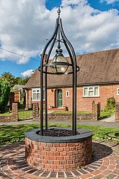 The wellhead marking the site of the original Epsom Well was constructed in 1989. Epsom Well (geograph 5921667).jpg