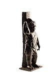 Bronzen beeldje van Attis met een herdersstaf in de linkerhand en een haas in de rechterhand, 75 tot 150 n.Chr., 10,5 cm hoog, gevonden in Tongeren,Gallo-Romeins Museum (Tongeren)[1]