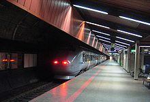 An Airport Express Train at the railway station Flytoget nationalteateret1.jpg