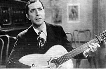 Vocalist Carlos Gardel brought tango to new audiences in the 1920s and 30s. Gardel con guitarra.jpg