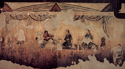 In a mural of Gakjeochong (각저총 "Tombs of Wrestlers"),[5] a Goguryeo tomb built around the 5th century shows a Goguryeo nobleman having a meal with two ladies.[6]