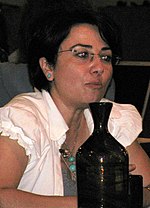 On 19 December MK Haneen Zoabi was initially disqualified from being re-elected in the 2013 election for "supporting terrorism and rejecting Israel as a Jewish and democratic state". Haneen Zoubi cropped.JPG