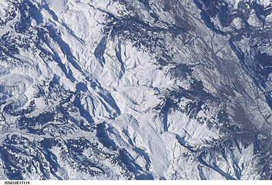 a view of Gsteig bei Gstaad and Gstaad (village in left side), Arpelistock, mountain La Fava, Glacier de Zanfleuron and Sanetsch Pass to Rhône valley from above