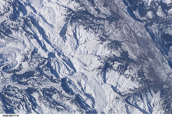 Bernese Alps with snow (and glaciers), Sion, Conthey and other settlements in Rhône valley