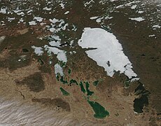 Ice clings to Lakes Winnipeg and Winnipegosis (MODIS 2021-05-11).jpg