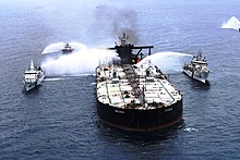 Indian Coast Guard and other vessels dousing and containing the fire on MT New Diamond in 2020 Indian Coast guard ships dousing fire.jpg