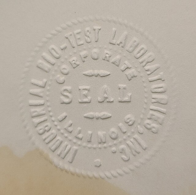Photograph of embossed IBT corporate seal.