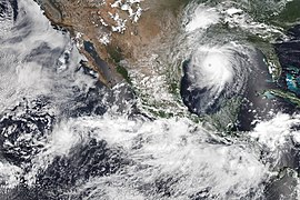 Tropical Storm Hernan near the Mexican coast on August 26, with Tropical Storm Iselle to the west, the prominent ITCZ to the south, and Atlantic Hurricane Laura to the east, in the Gulf of Mexico Iselle, Hernan and Laura 2020-08-26.jpg