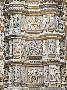 Kandariya Mahadeva temple carvings. Le Temple Kandariya Mahadeva (Khajuraho) (8503001895).jpg