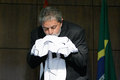 O Presidente Luis Inácio Lula da Silva beija a camisa do seu time do coração, o Corinthians.