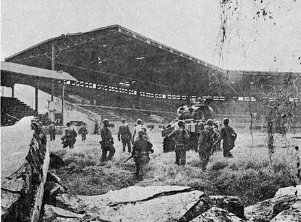 U.S. troops at the Rizal Baseball Stadium, Manila, 16 February 1945