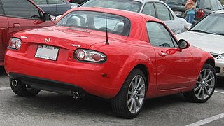 Mazda Miata Power Retractable Hard Top (PRHT) c. 2007, with 77 lb (35 kg) polycarbonate hardtop and identical cargo capacity to the soft top version[14]