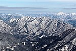 南方の伊吹山から望む貝月山、その右奥に能郷白山 （2013年1月5日）