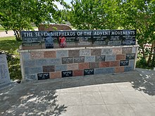 A memorial at the Mount Carmel site identifying leaders of the Adventist movement from Ellen G. White to Vernon Howell Mt Carmel Center memorial closeup, 2022.jpg