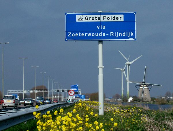 Dutch scenery along A4 with windmill "Zelden van Passe" near Zoeterwoude.