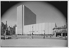 The Coliseum in April 1956, viewed from the southwest corner of Central Park, at Columbus Circle New York Coliseum, Columbus Circle, New York City. LOC gsc.5a17527.jpg