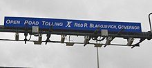 Sign reading "Open Road Tolling Rod R. Blagojevich, Governor" Open Road Tolling (2424376140) (cropped).jpg