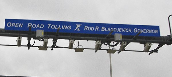 Sign reading "Open Road Tolling Rod R. Blagojevich, Governor"