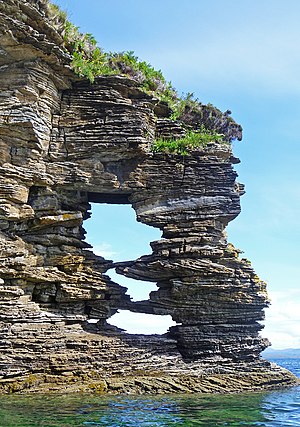 Cross-bedded Jurassic sandstones of the Bearreraig Sandstone Formation near Glasnakille, Strathaird Perforated headland below Glasnakille - geograph.org.uk - 2542017.jpg