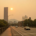 Portland skyline during 2015 Oregon wildfires - Big Pink, Portland sign from Burnside Bridge.jpg