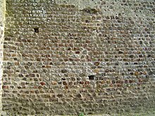 Taş duvarın fotoğrafı.