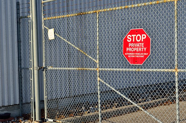 Gate with a private property sign