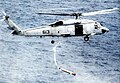 SH-60F Seahawk HS-14 dropping torpedo 1996.jpg