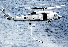 A HS-14 SH-60F Seahawk drops a torpedo in 1996 SH-60F Seahawk HS-14 dropping torpedo 1996.jpg