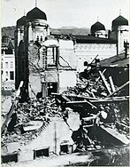 Damaged houses near the synagogue in Sarajevo (April 1941) Sarajevo bombed Synagogue 1941.jpg