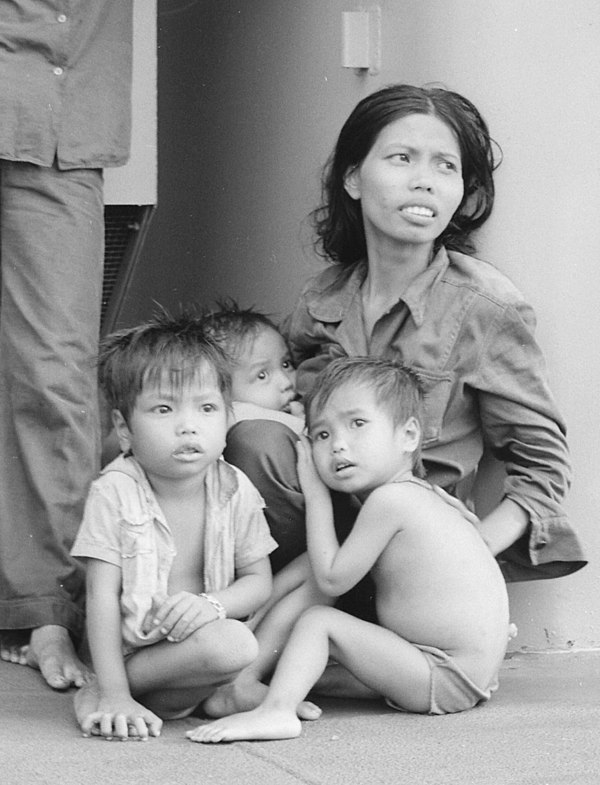 A family of Vietnamese refugees rescued by a US Navy ship.