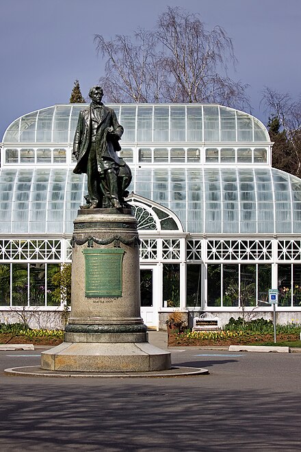 Statue of William Seward in front of the botanical conservatory at Volunteer Park