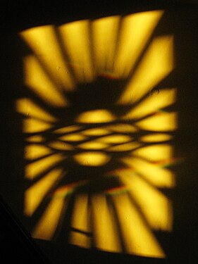 Sun through the original leaded glass of an old house in the Beechview neighborhood of Pittsburgh