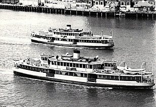 Karrabee (front) and sister Karingal as diesel vessels. The larger Karrabee had 13 windows along the top deck, in comparison to 11 on Karingal