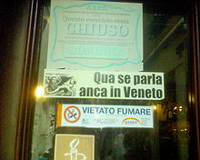 A sign in Venetian reading Here Venetian is also spoken