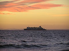The Spirit of Tasmania sailing through Port Phillip Bay at dusk (Seen from Elwood Beach)
