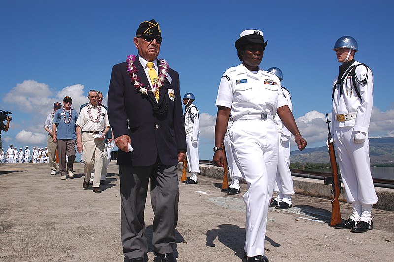 File:US Navy 040521-N-8157C-098 Survivor Alex Bernal is escorted by Petty Officer 2nd Class Camp to a waiting departure boat.jpg
