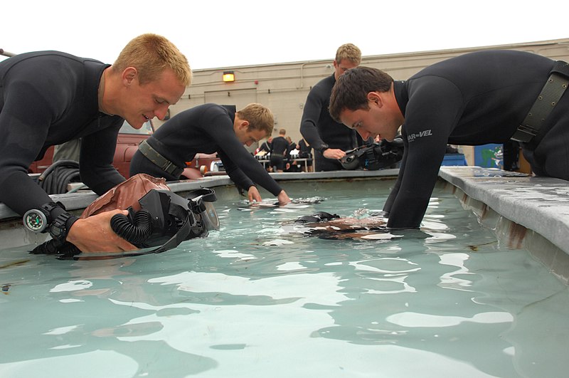 File:US Navy 090423-N-4301H-044 Basic Underwater Demolition SEAL (BUD-S) candidates check their underwater breathing apparatuses for proper ventilation and safety before participating in dive training in Coronado Bay.jpg