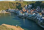 View of the fishing village Staithes, Yorkshire, England.jpg