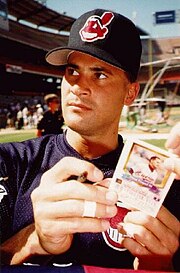 Cleveland Indians player Omar Vizquel wearing a baseball cap showing the image of Chief Wahoo in 1996 Vizquel96.jpg