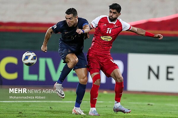 Ronaldo (left) playing for Al Nassr against Persepolis in the 2023–24 AFC Champions League.