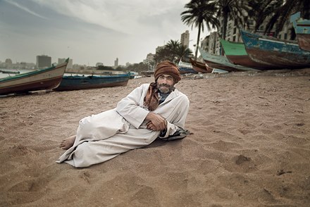 Content man on a beach in Alexandria (Egypt)